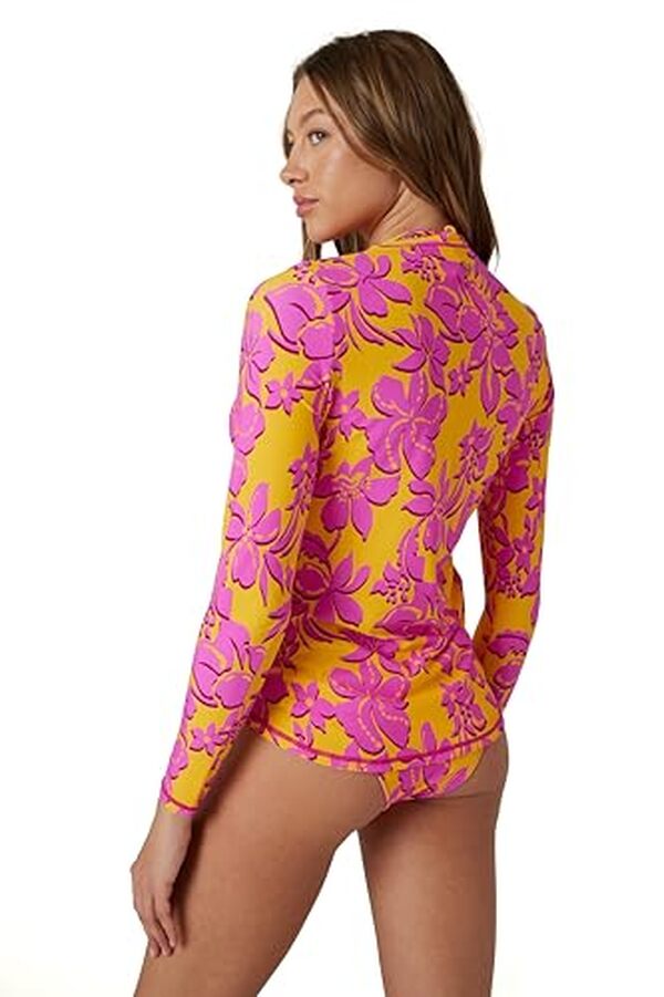 Découvrez le test complet de la chemise rashguard Roxy femme avec manches longues et tige dorée : confort, design et protection solaire au rendez-vous
